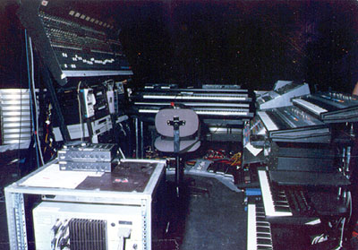 Vangelis' equipment including synths, pedal and mixer.