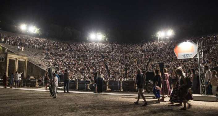 Audience seated at the ancient open air theatre.